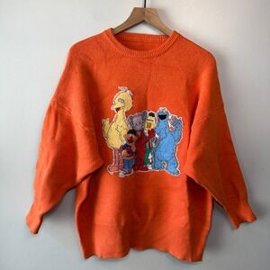 KAWS Uniqlo Sesame Street NYC Orange Knit Sweater Oversized Crewneck Streetwear